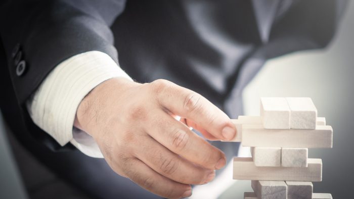 hand on block shutterstock_455247961